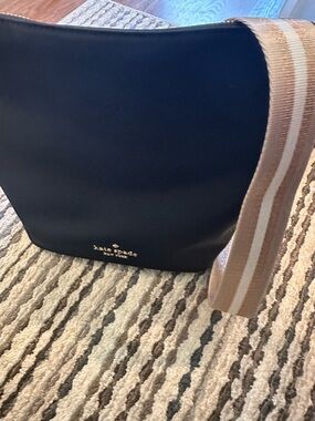 kate spade black leather crossbody with striped tan strap